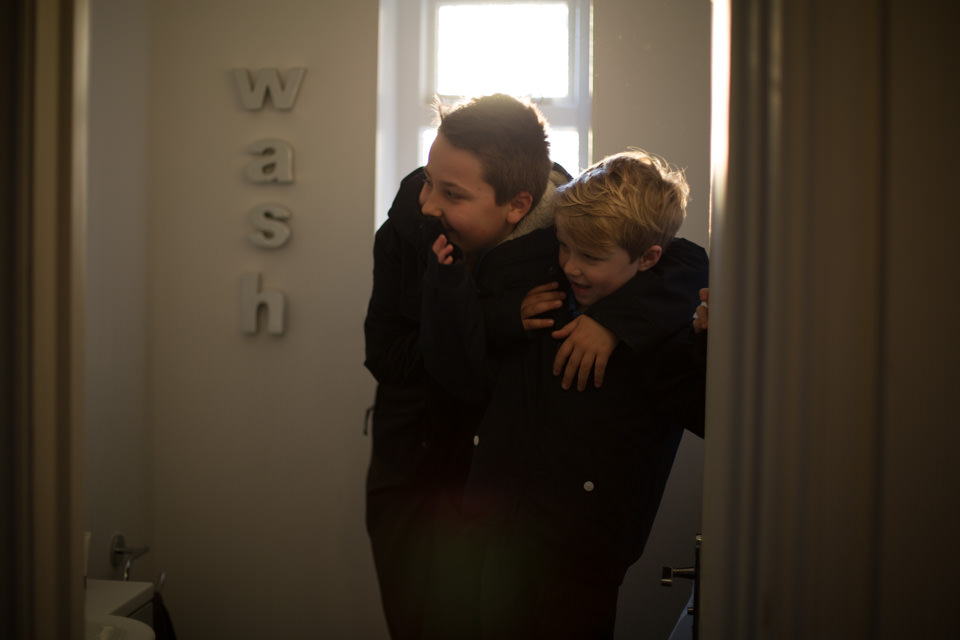 brothers cuddling and laughing Sevenoaks Family photographer 3 Boys and Me Photography