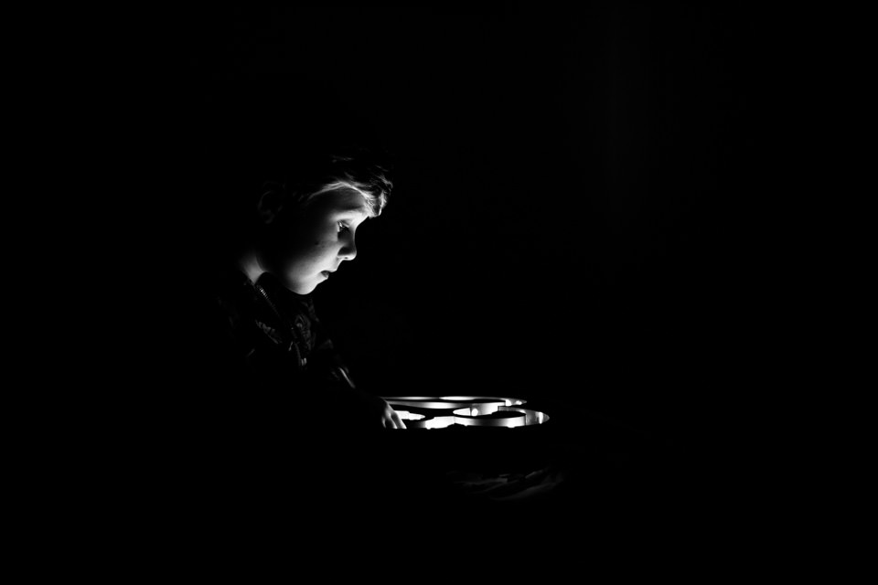 silhouette of a boy with a nightlight Sevenoaks Family photographer 3 Boys and Me Photography