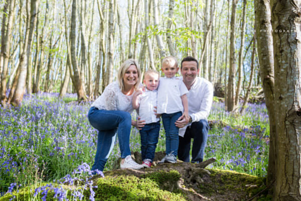 family of 4 with two little boys taken at their sevenoaks bluebell photoshoot