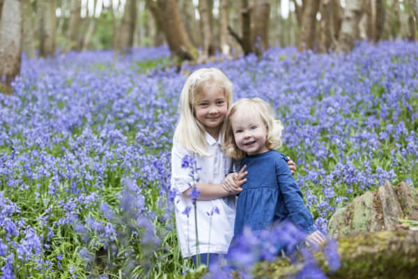 sisters at their bluebell photoshoot in Riverhill Himalayan gardens Sevenoaks