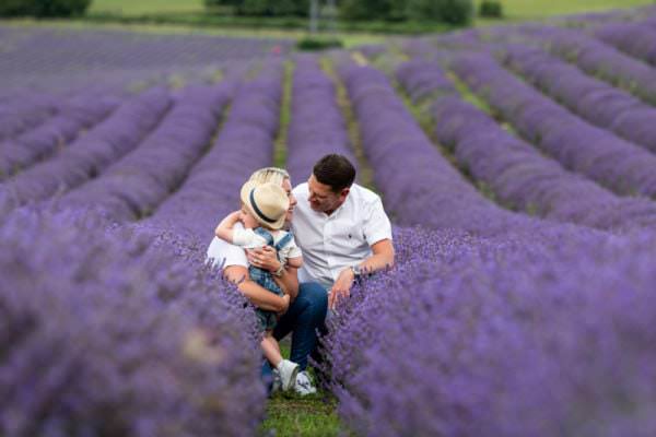 Family of 3 with their little boy photographed at their Kent lavender photoshoot in Shoreham