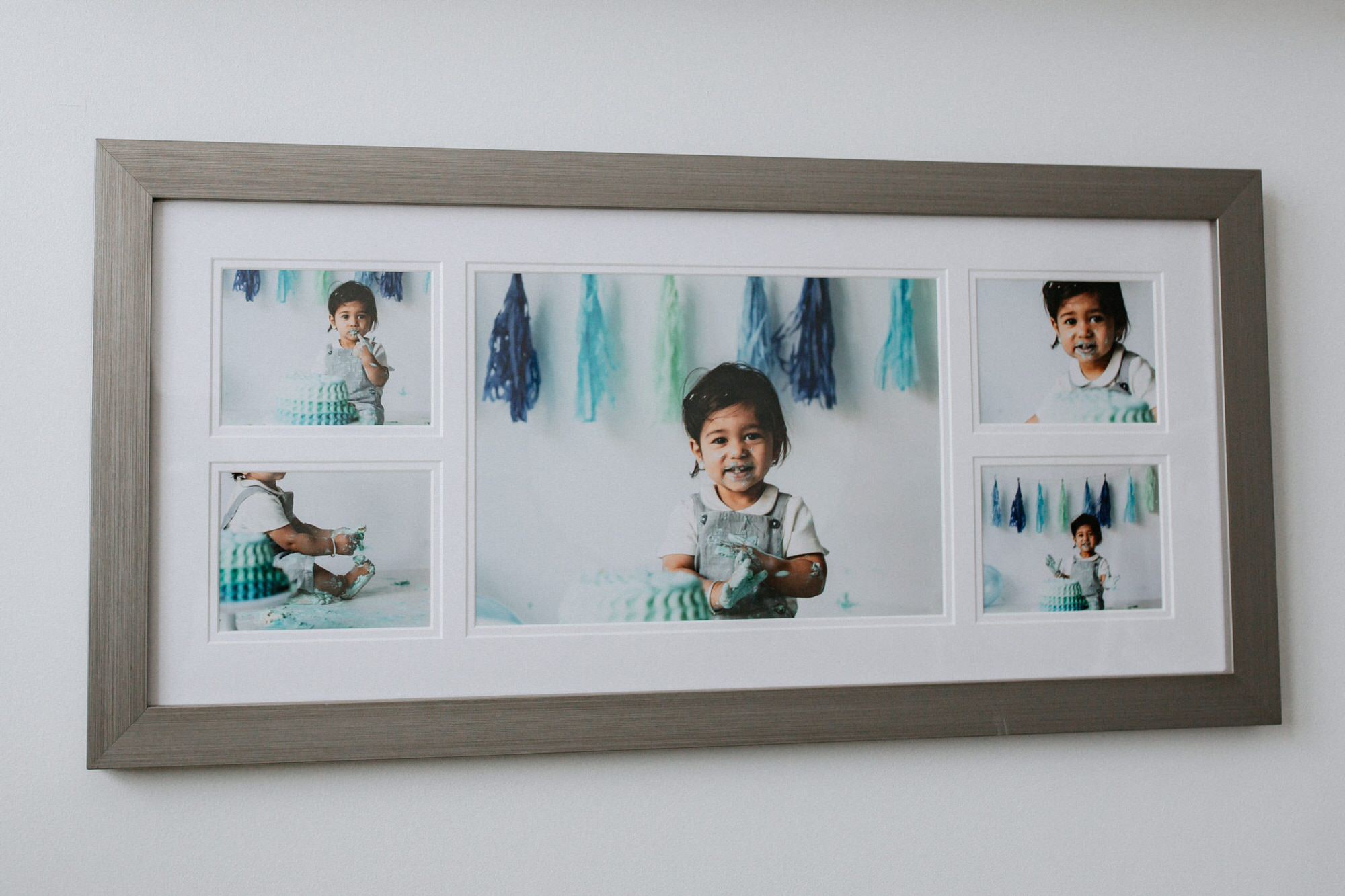 white frame with deep recess showcasing newborn baby taken at their Kent newborn photoshoot in Bexley