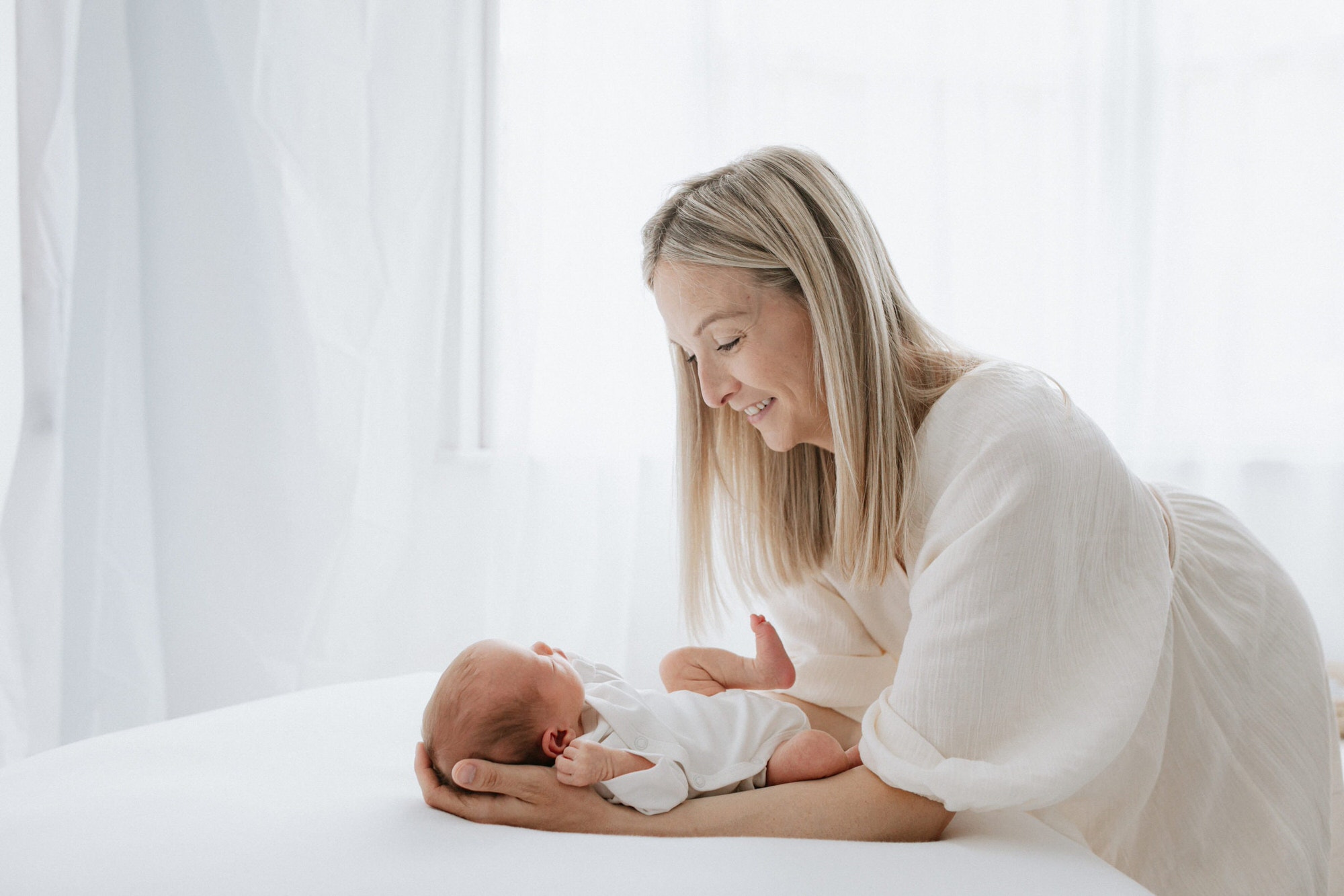 beautiful mummy and her baby at their Kent newborn photoshoot in Bexley