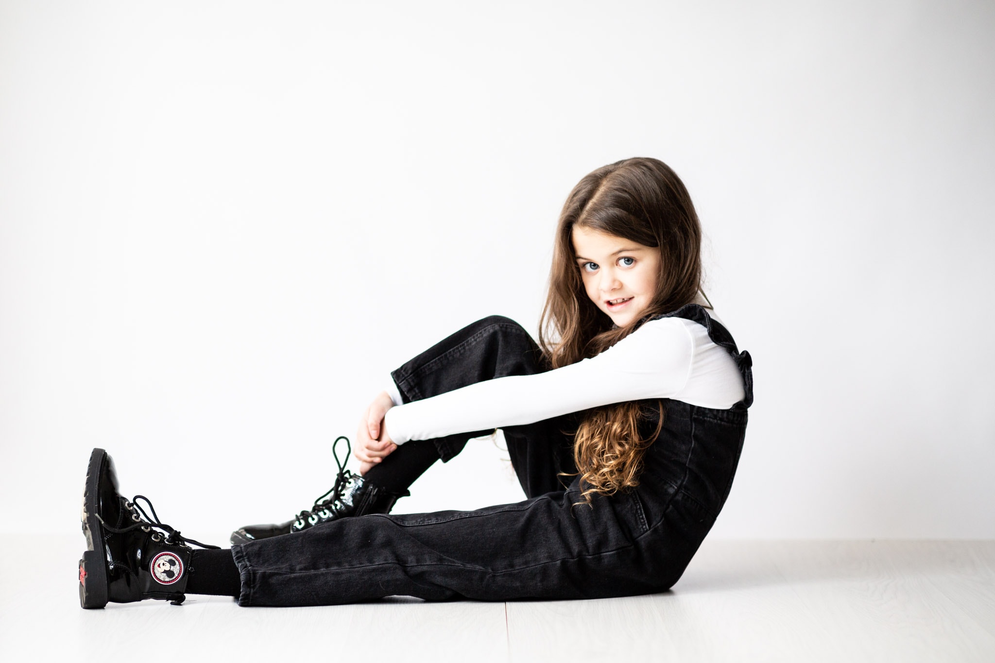 young girl sat on floor at her kent modelling portfolio updates shoot in Bexley Kent