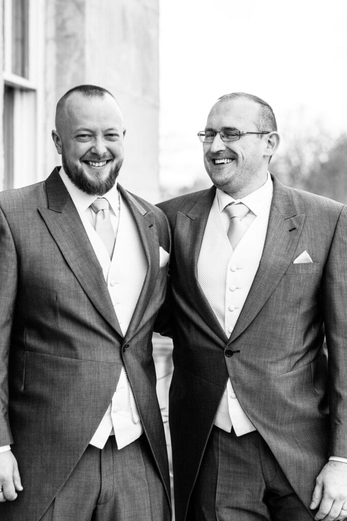Good and Best man laughing at their Danson House Wedding in Bexleyheath