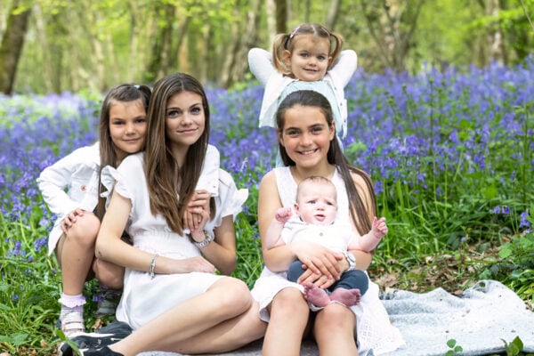 Beautiful sibling shot in the Kent bluebells at their Sevenoaks family photoshoot in spring
